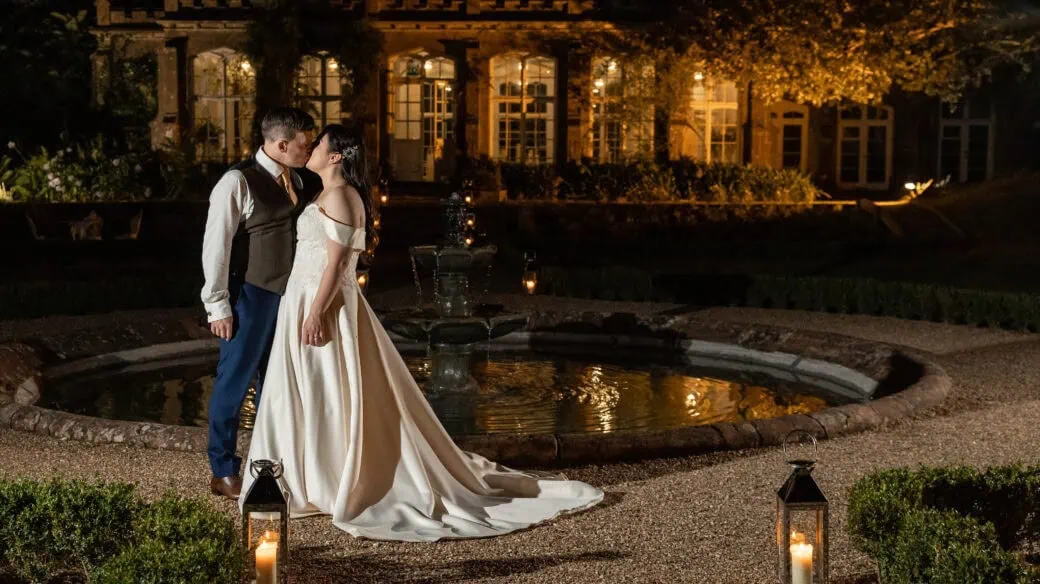 A bride and groom during twilight