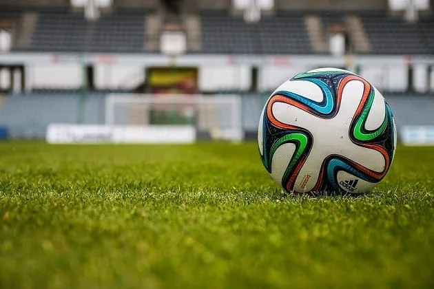 Football on a pitch