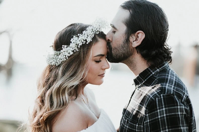 Bride and groom kiss|Flower